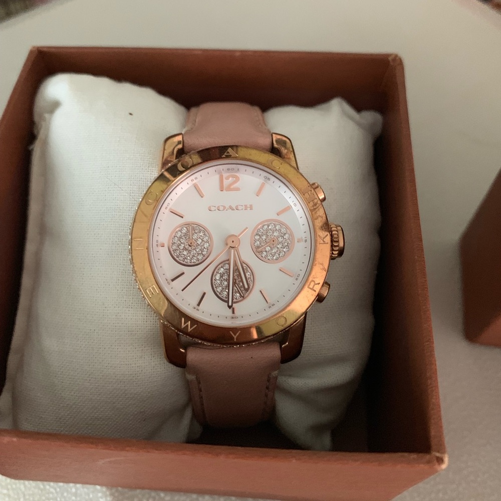 Gently Used Coach watch with original box & tags.